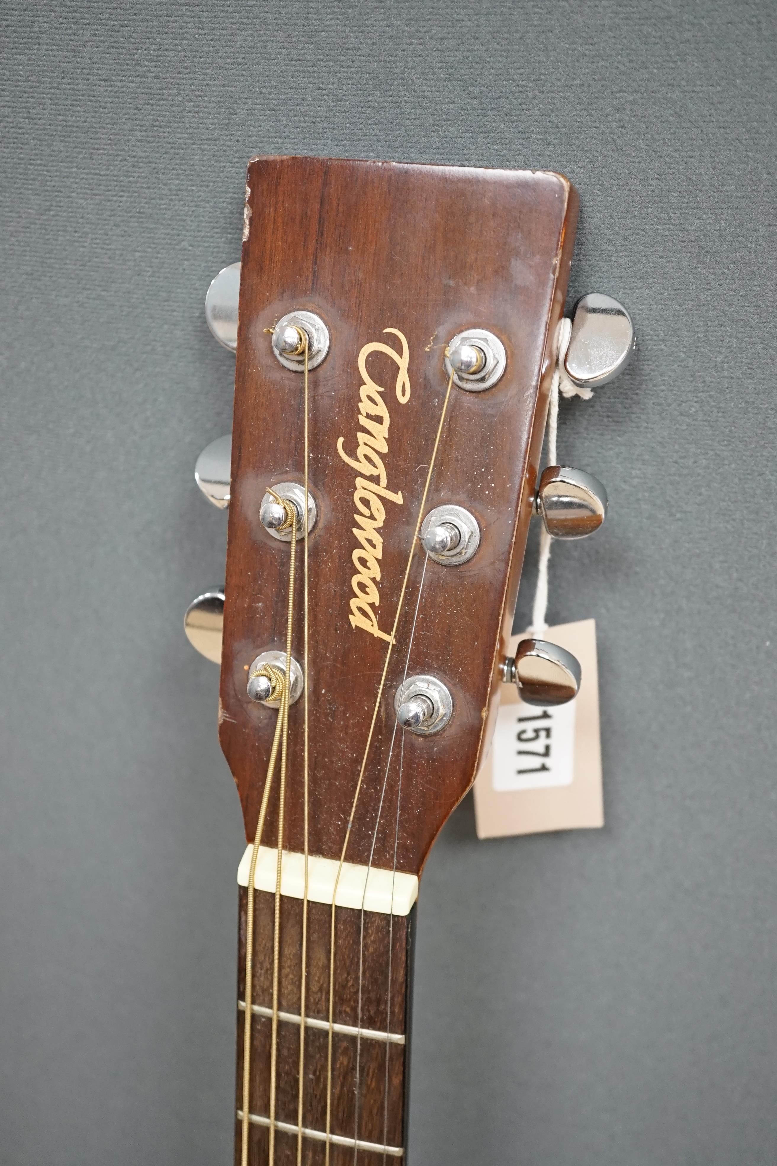 A Tanglewood acoustic guitar (left handed)